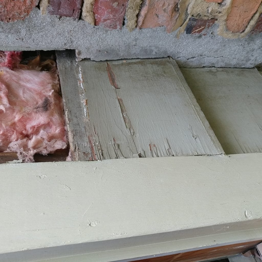 wood damaged upstairs bedroom