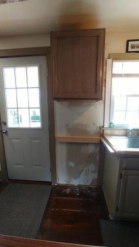 new cabinet wall repaired