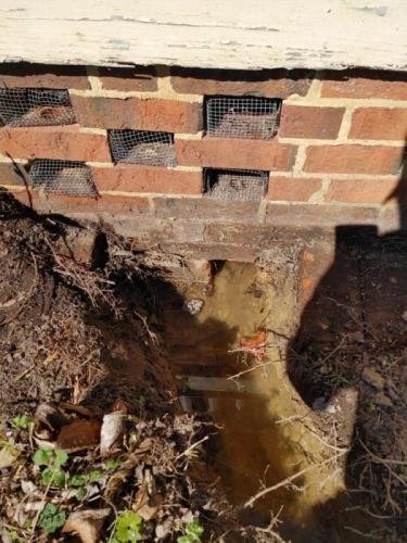 water coming out after brick removed