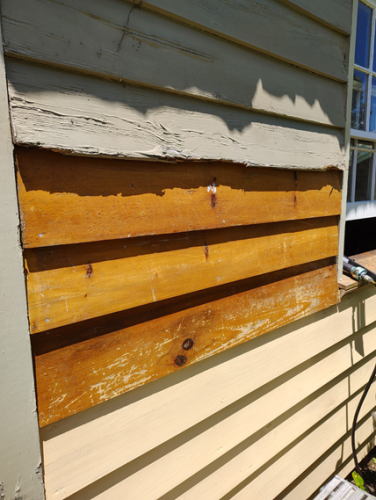 Adding old den flooring to side